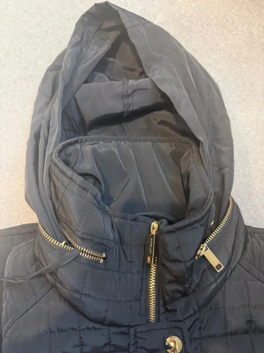 Michael Kors Women’s Size Medium Quilted Black Jacket with fold away hood